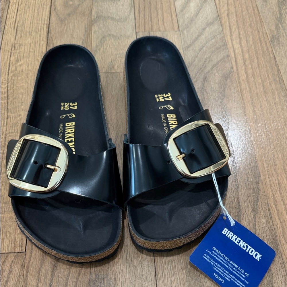 Birkenstock Black Slides with Gold Accent